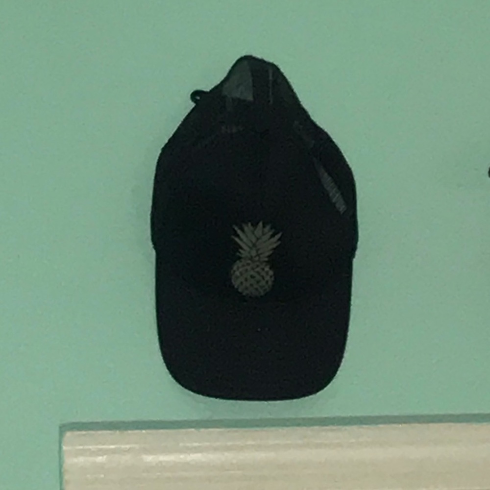 black hat with silver pineapple